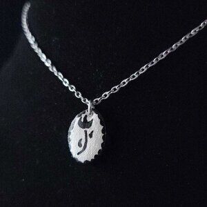 Dainty iridescent flower necklace with a small silver chain